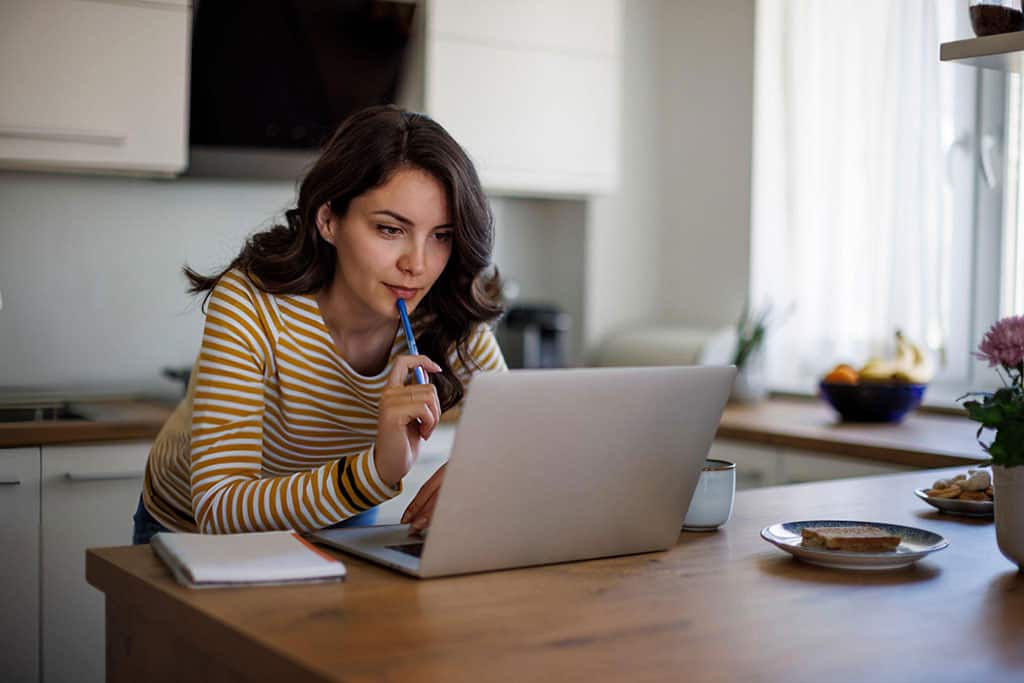 Picture of a woman comparing packages